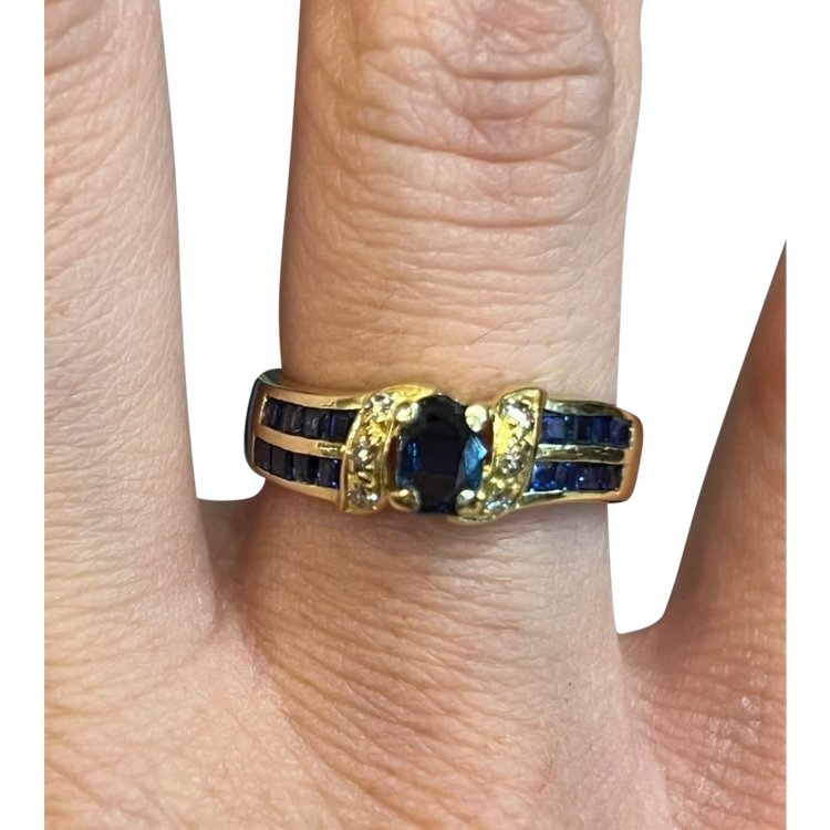 Sapphire and white stone ring