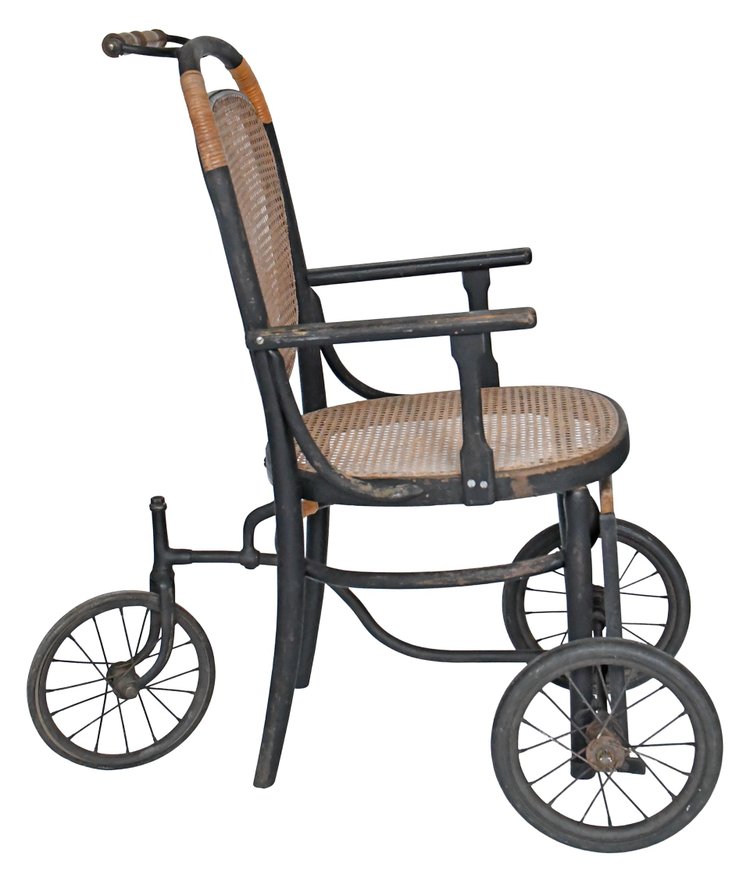 Eugène Vincent, sedia a rotelle in legno tornito