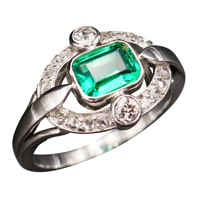 Anello con smeraldo e diamante colombiano.