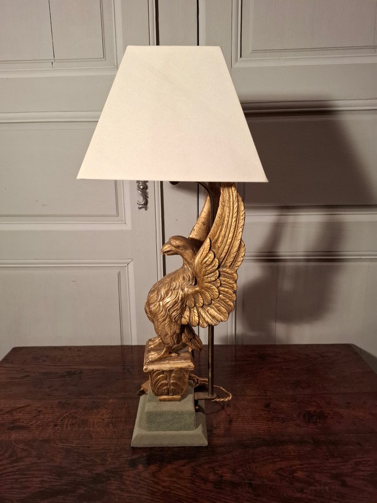 19th century gilded wooden eagle lamp.