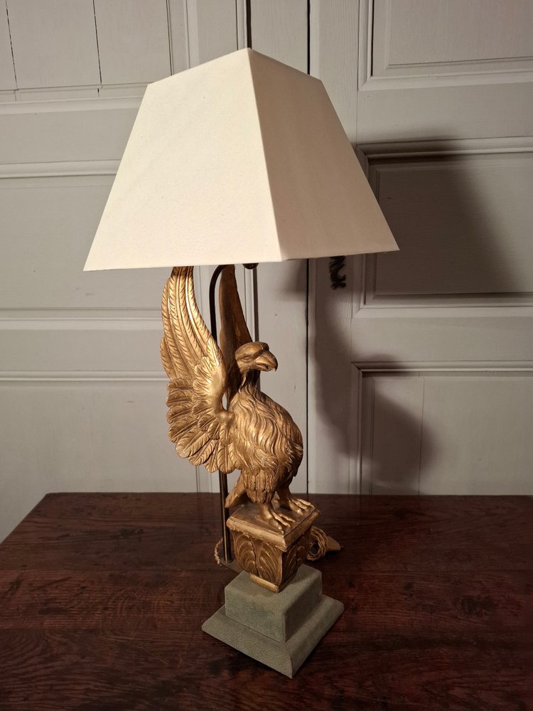 19th century gilded wooden eagle lamp.
