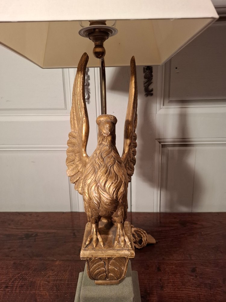 19th century gilded wooden eagle lamp.