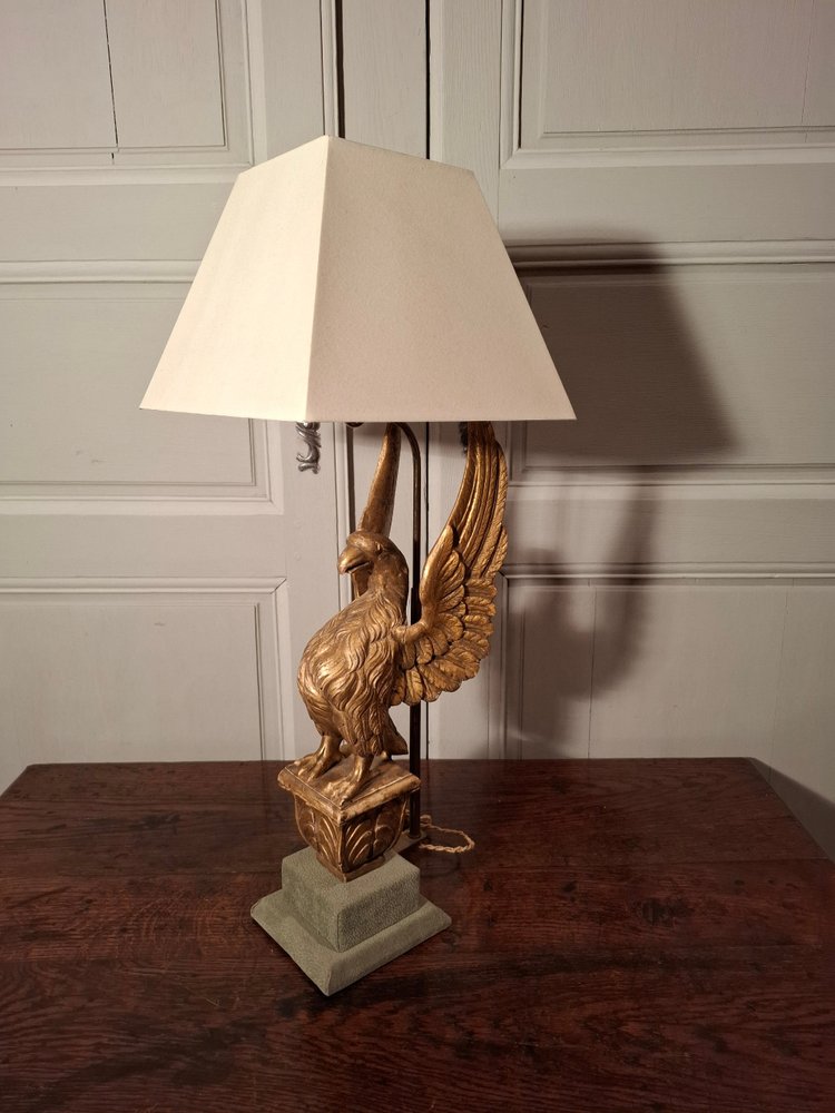 19th century gilded wooden eagle lamp.