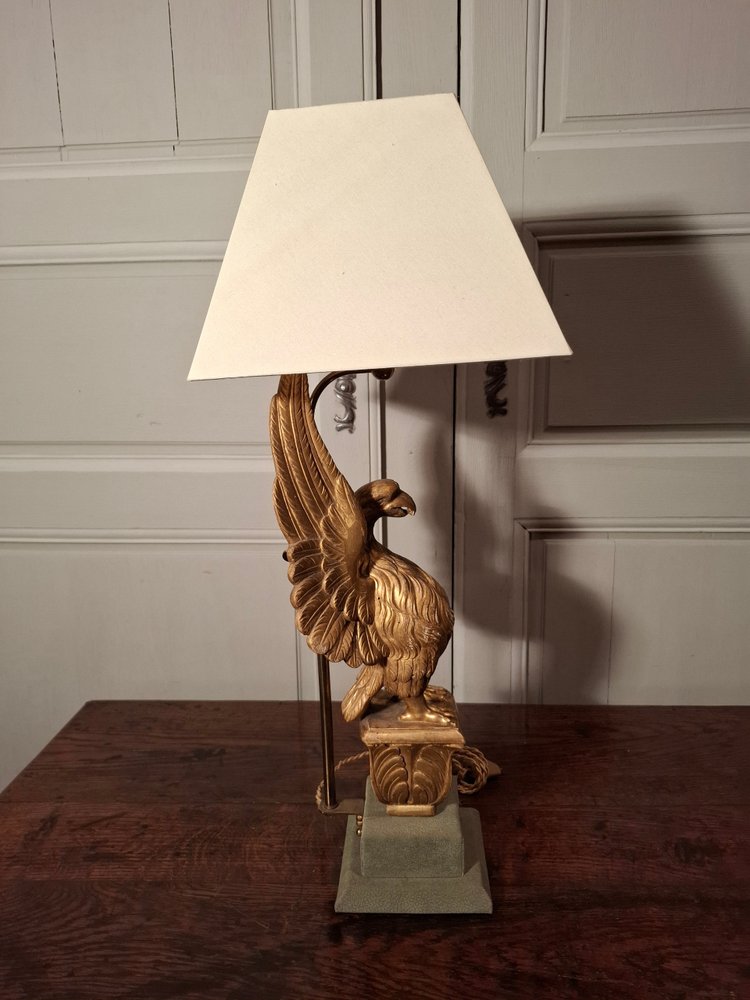 19th century gilded wooden eagle lamp.