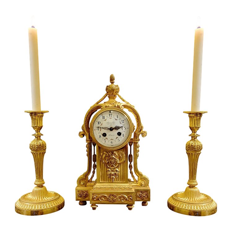 Louis XVI Style Pendulum Clock and Pair of Candlesticks in Chiseled Gilded Bronzes Susse Fd