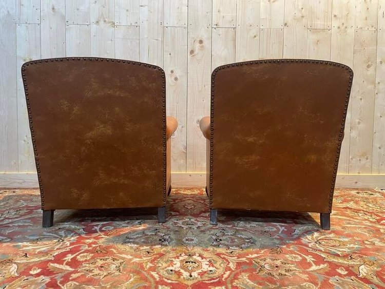 Paire de fauteuils Club en imitation cuir 
