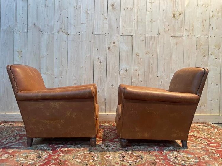 Paire de fauteuils Club en imitation cuir 