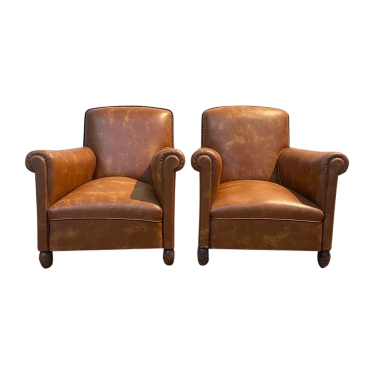 Paire de fauteuils Club en imitation cuir 