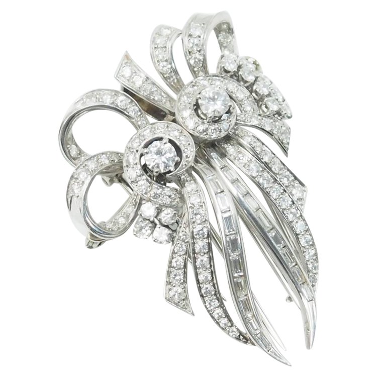 Spilla art deco a doppia clip in oro bianco e platino, diamanti