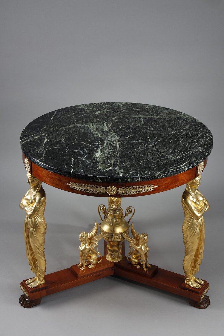 LARGE EMPIRE STYLE PEDESTAL TABLE IN MAHOGANY AND MAHOGANY VENEER