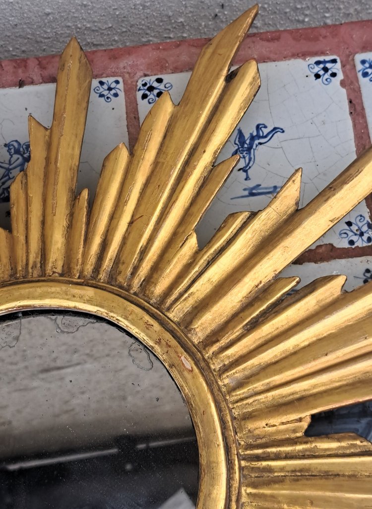 Miroir soleil en bois doré étoilé milieu XXème