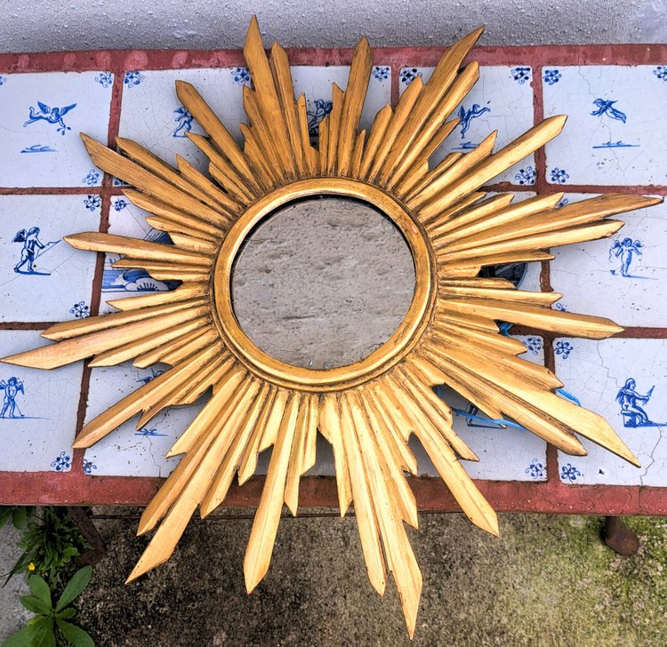 Miroir soleil en bois doré étoilé milieu XXème