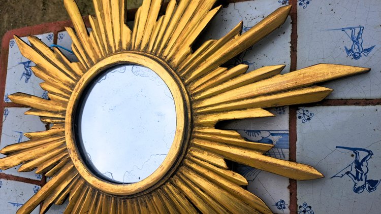 Miroir soleil en bois doré étoilé milieu XXème
