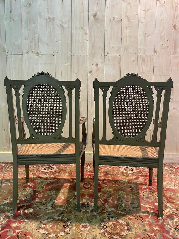 Pair of Louis XVI armchairs with re-edging and caning.