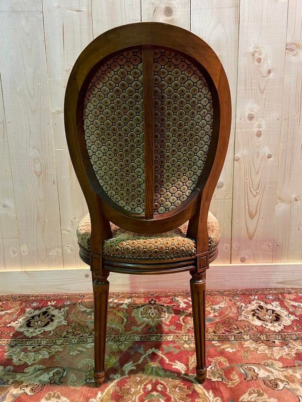 Suite de 12 chaises de Style Louis XVI 