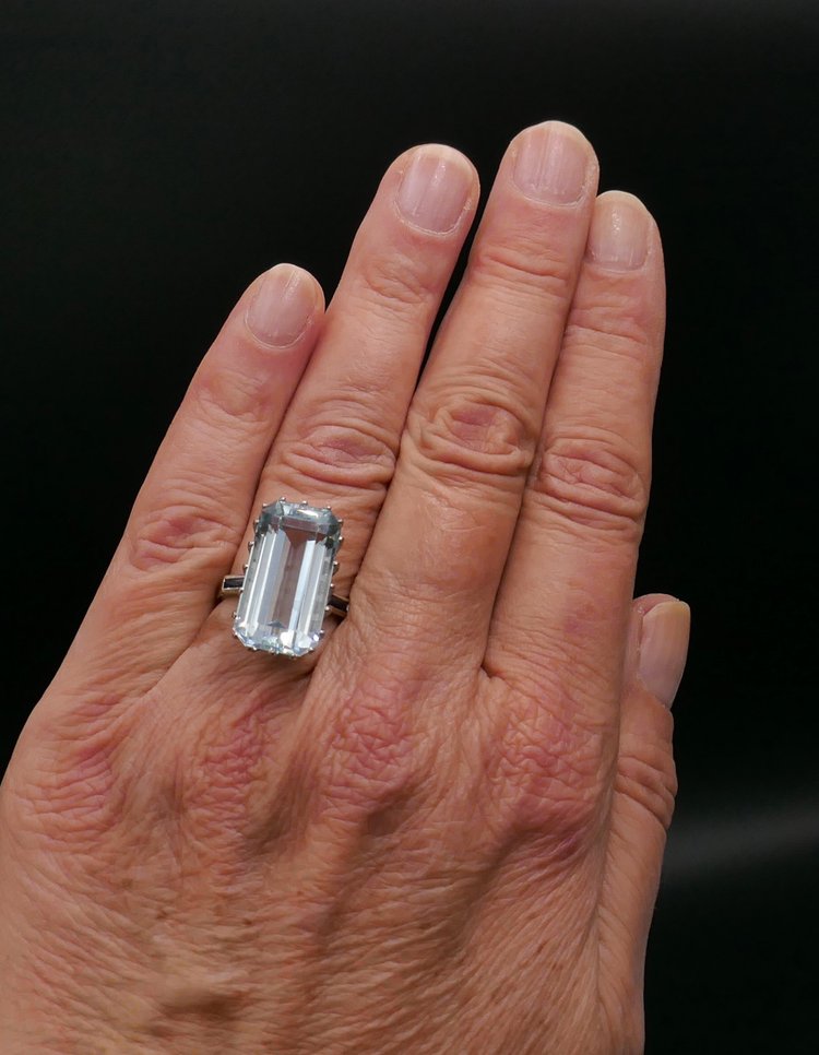 Ring Set with an Aquamarine Shouldered with Calibrated Sapphires.