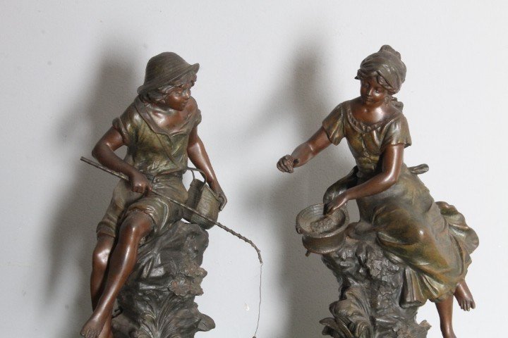 Pair of late 19th century Auguste Moreau sculptures in antimony patinated Fisherman and Peasant Girl . Mis h 46