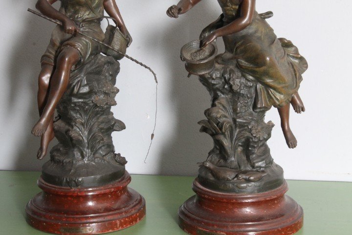Pair of late 19th century Auguste Moreau sculptures in antimony patinated Fisherman and Peasant Girl . Mis h 46