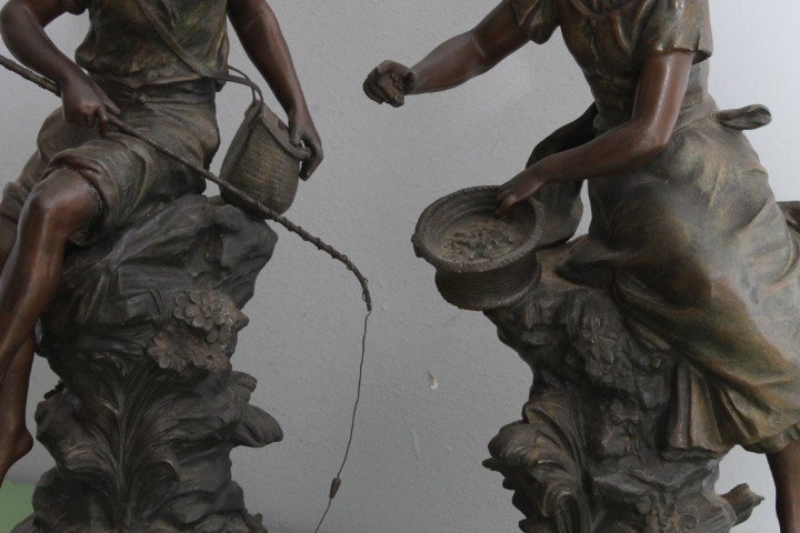 Pair of late 19th century Auguste Moreau sculptures in antimony patinated Fisherman and Peasant Girl . Mis h 46
