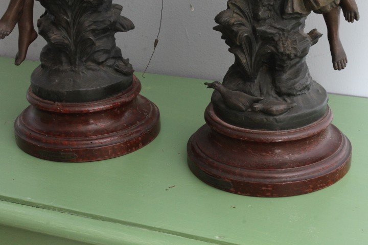 Pair of late 19th century Auguste Moreau sculptures in antimony patinated Fisherman and Peasant Girl . Mis h 46