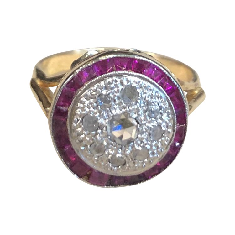 Anello con rubino rotondo e diamante