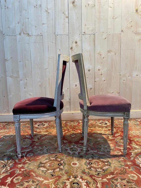 Suite de 8 chaises style Louis XVI modèle Trapèze