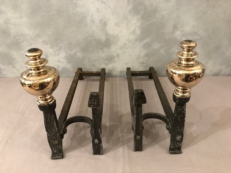 Pair of wrought iron and brass andirons from the late 17th and early 18th centuries