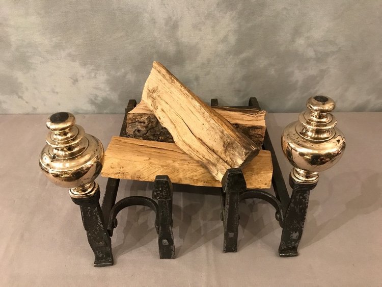 Pair of wrought iron and brass andirons from the late 17th and early 18th centuries