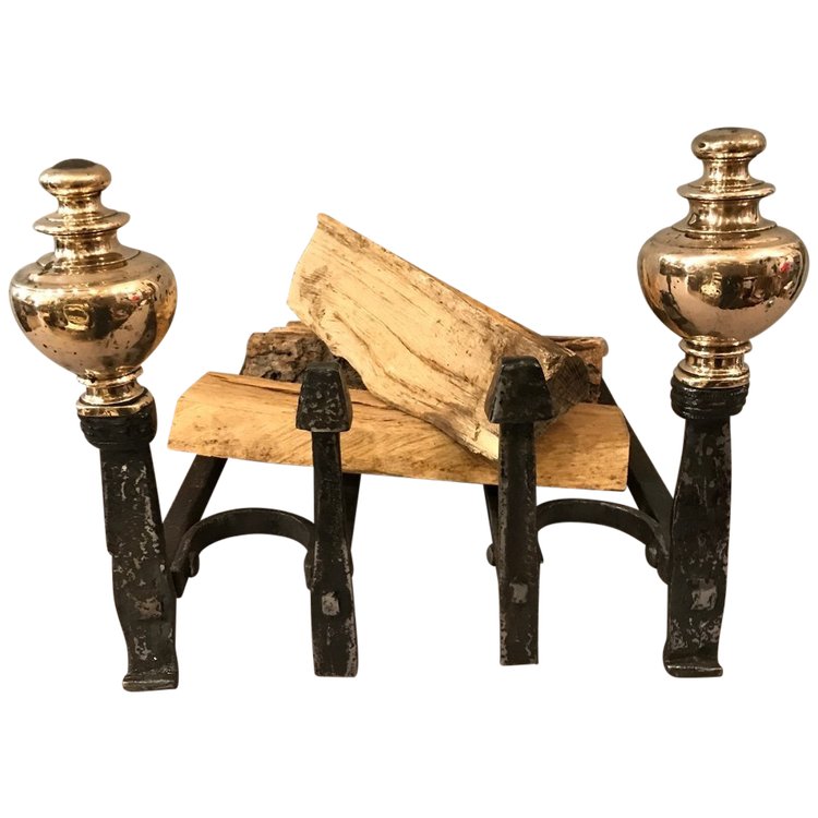 Pair of wrought iron and brass andirons from the late 17th and early 18th centuries