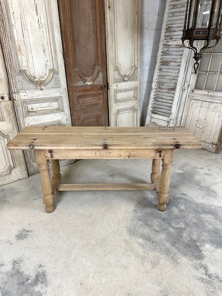 Table de milieu en chêne 20e siècle 