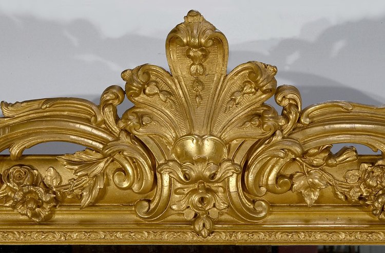 Important Miroir en bois doré, style Louis XV – 1re partie XIXe