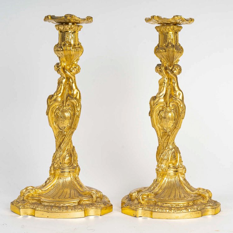 After Juste-Aurèle Meissonnier Pair of Louis XV style chiseled gilt bronze candlesticks Circa 1880