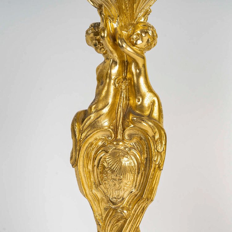 After Juste-Aurèle Meissonnier Pair of Louis XV style chiseled gilt bronze candlesticks Circa 1880