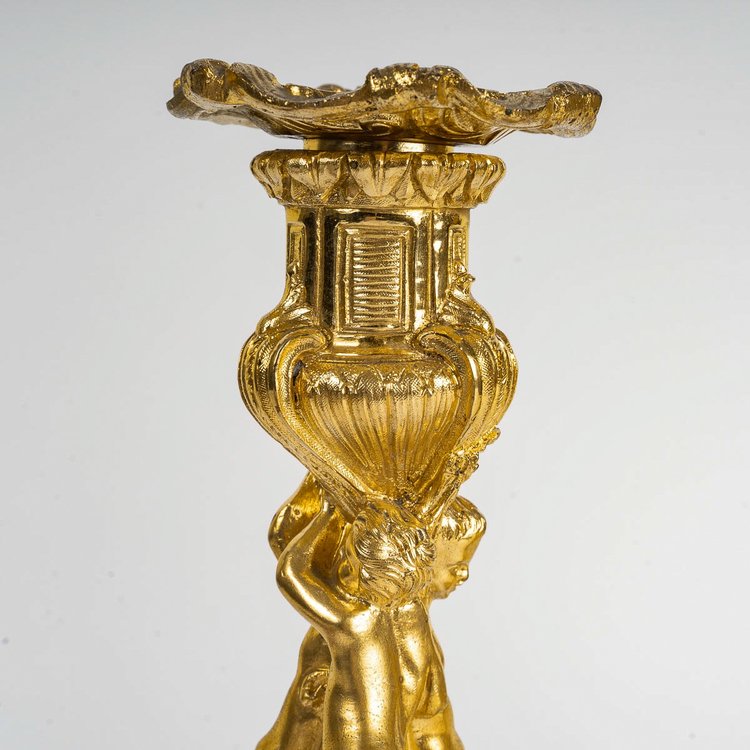 After Juste-Aurèle Meissonnier Pair of Louis XV style chiseled gilt bronze candlesticks Circa 1880