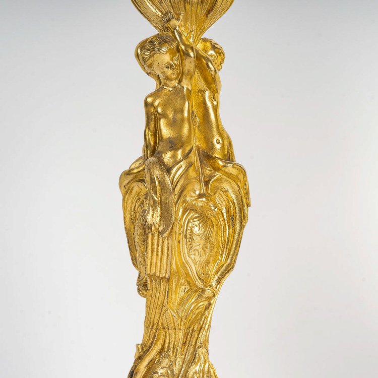 After Juste-Aurèle Meissonnier Pair of Louis XV style chiseled gilt bronze candlesticks Circa 1880