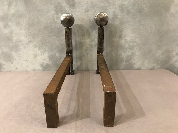 Modernist andirons in polished iron circa 1970
