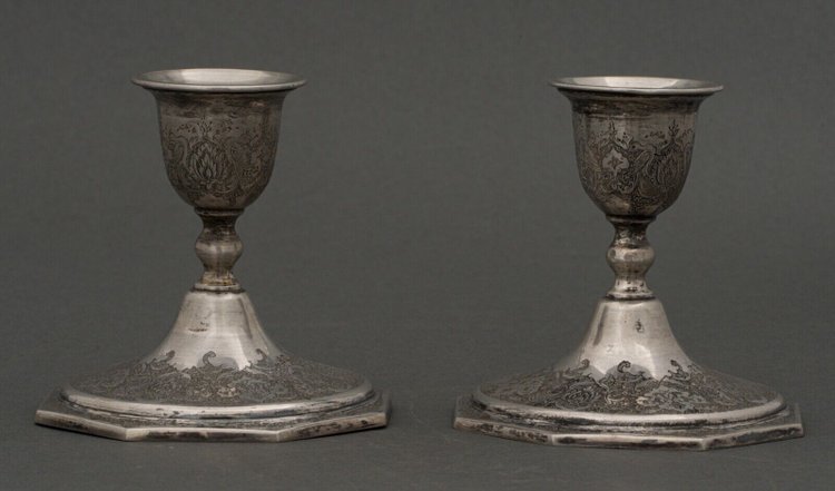 Pair of 19th-century Persian silver candlesticks, engraved with bird designs hallmark 84