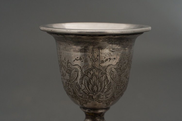Pair of 19th-century Persian silver candlesticks, engraved with bird designs hallmark 84