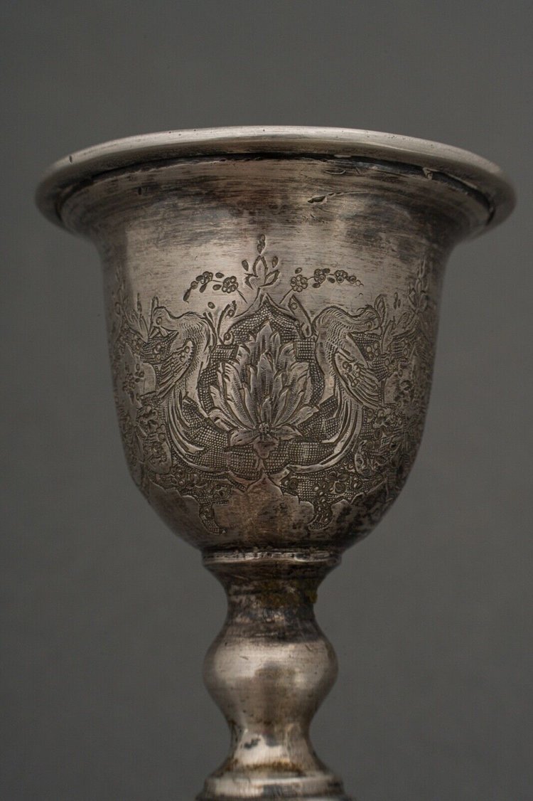 Pair of 19th-century Persian silver candlesticks, engraved with bird designs hallmark 84