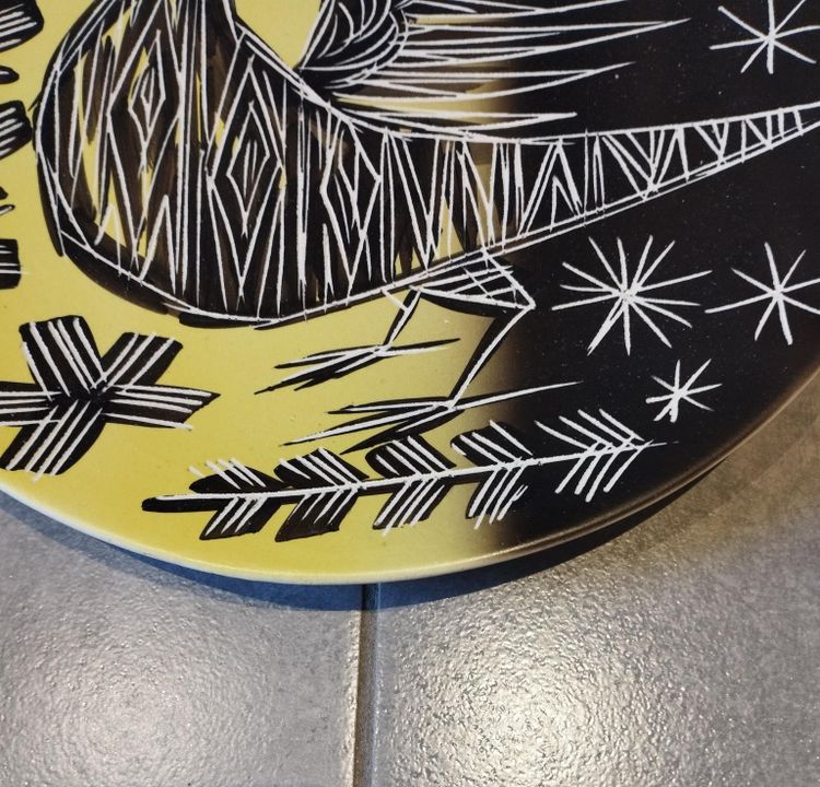 Vallauris plate with incised decoration.