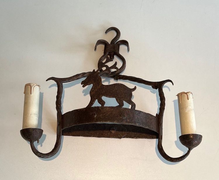 Paire d'Appliques En Fer Forgé Représentant des Animaux. Travail Français. Vers 1940
