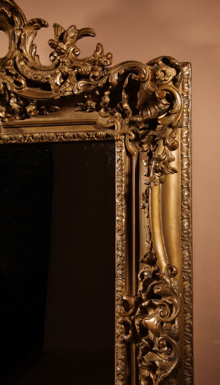 Very impressive original gilded wood and gesso mirror in the Louise Quinze XV style, circa 1900.