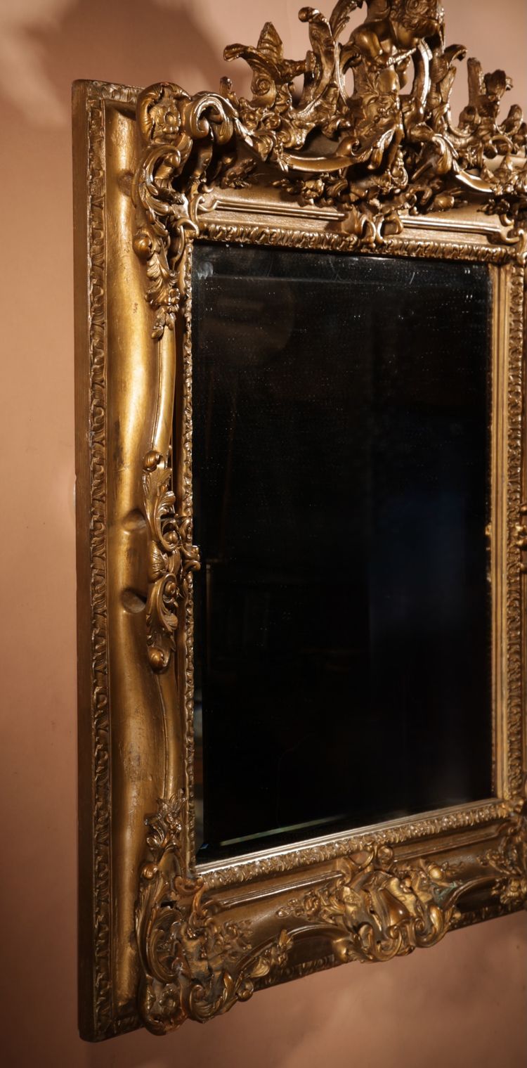 Very impressive original gilded wood and gesso mirror in the Louise Quinze XV style, circa 1900.