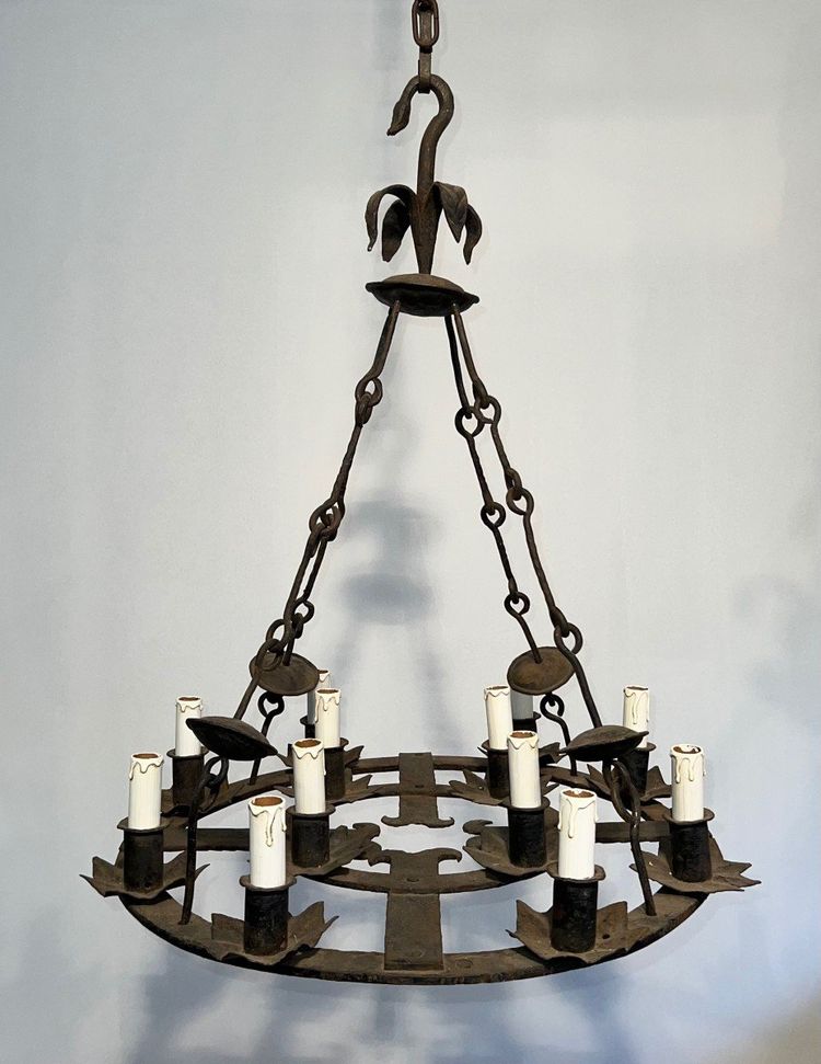 Important 12-Light Wrought Iron Chandelier. French Gothic work. Circa 1940