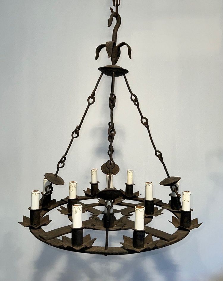 Important 12-Light Wrought Iron Chandelier. French Gothic work. Circa 1940