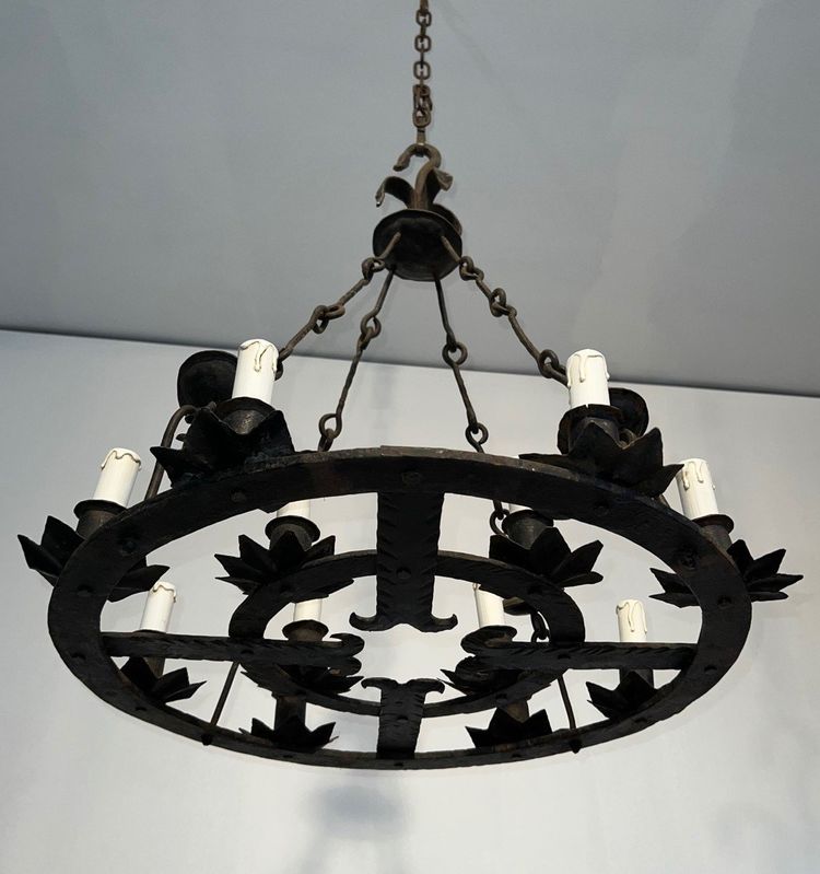 Important 12-Light Wrought Iron Chandelier. French Gothic work. Circa 1940