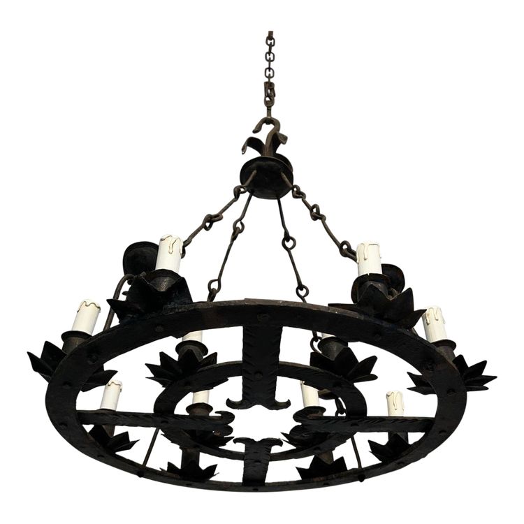 Important 12-Light Wrought Iron Chandelier. French Gothic work. Circa 1940