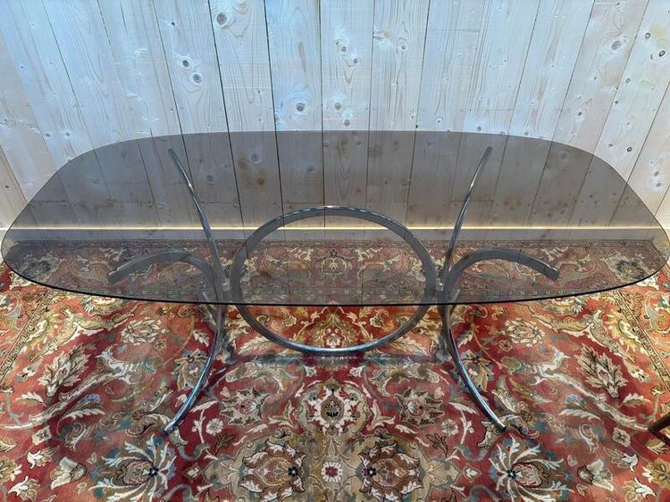 Table  à manger contemporaine verre et chrome .