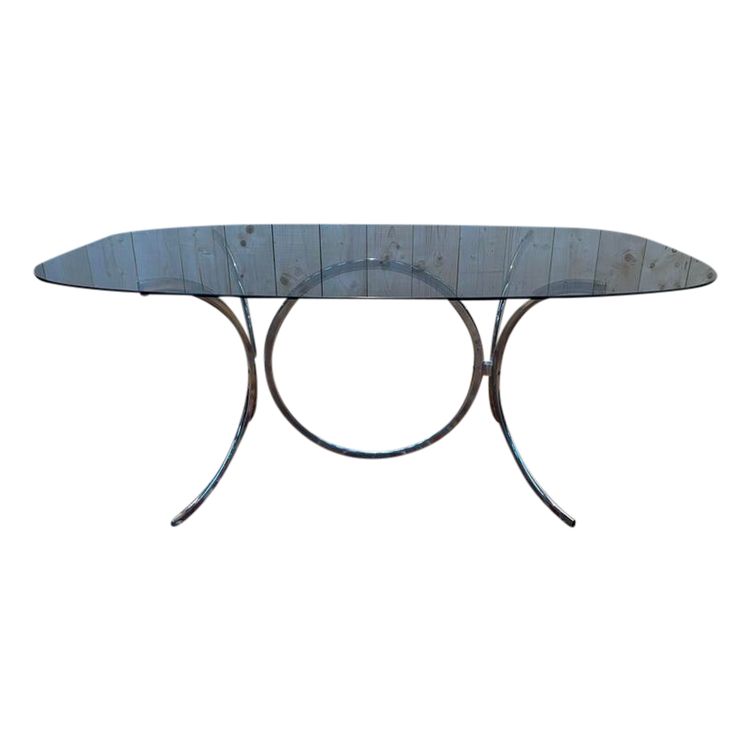 Table  à manger contemporaine verre et chrome .