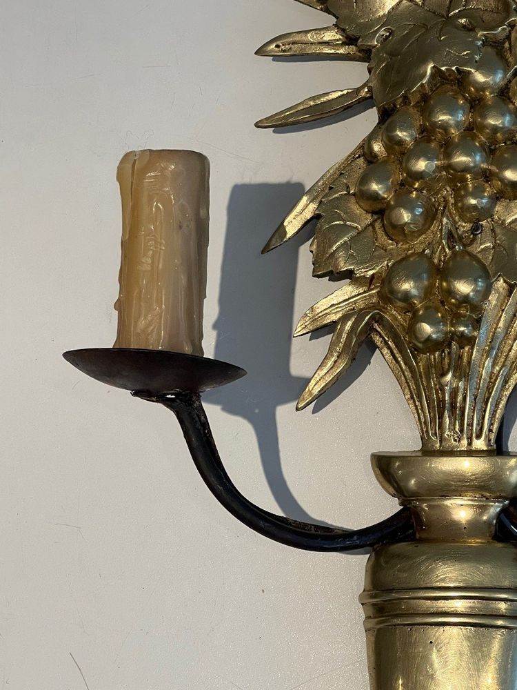 Pair of bronze and wrought iron wall lights depicting a bowl of fruit. French work.